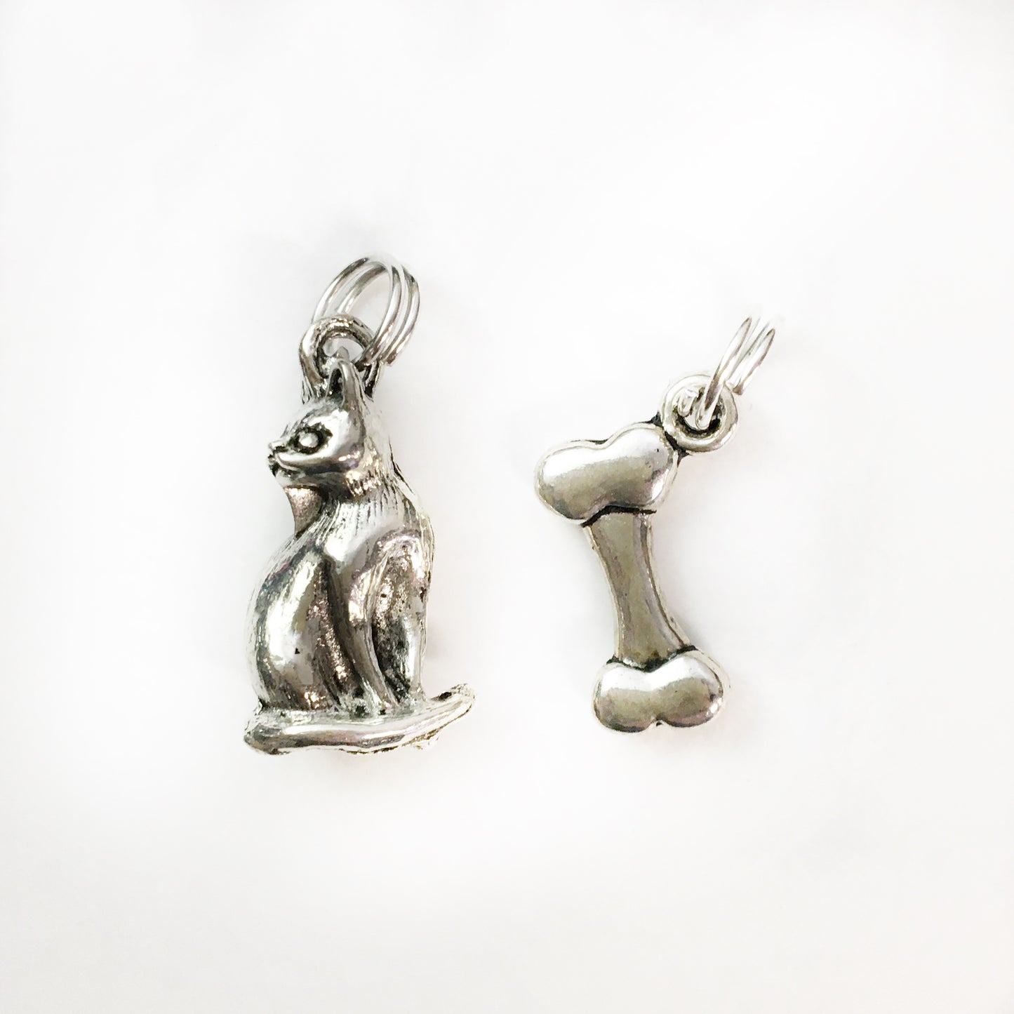 cat or bone charms for memory capsules