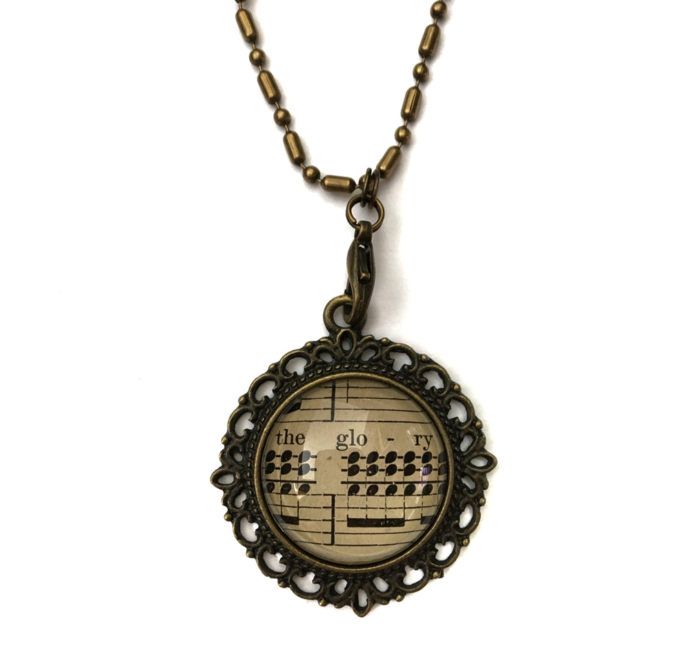 handmade real sheet music form the 1800's vintage necklace sealed under glass cabachon necklace Anthologie