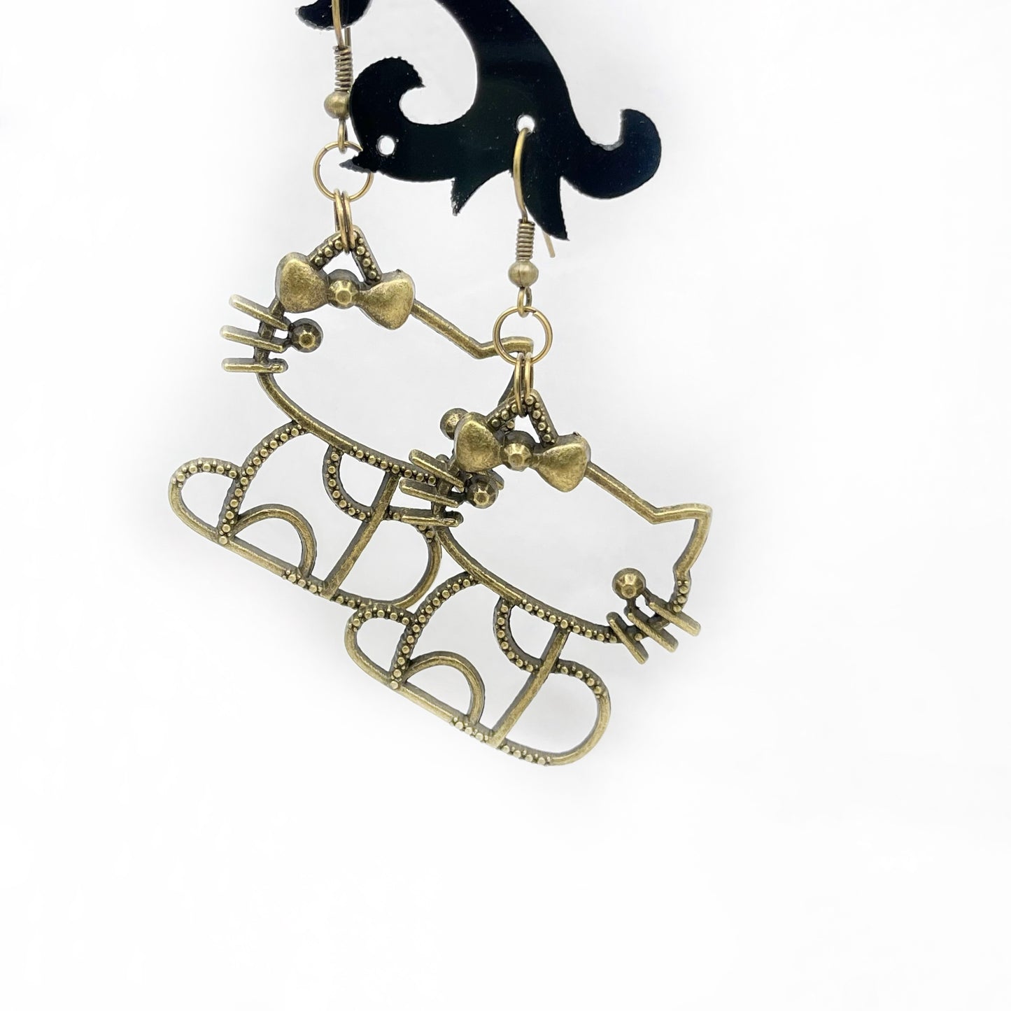 cat dangle earrings anthologie collective bronze