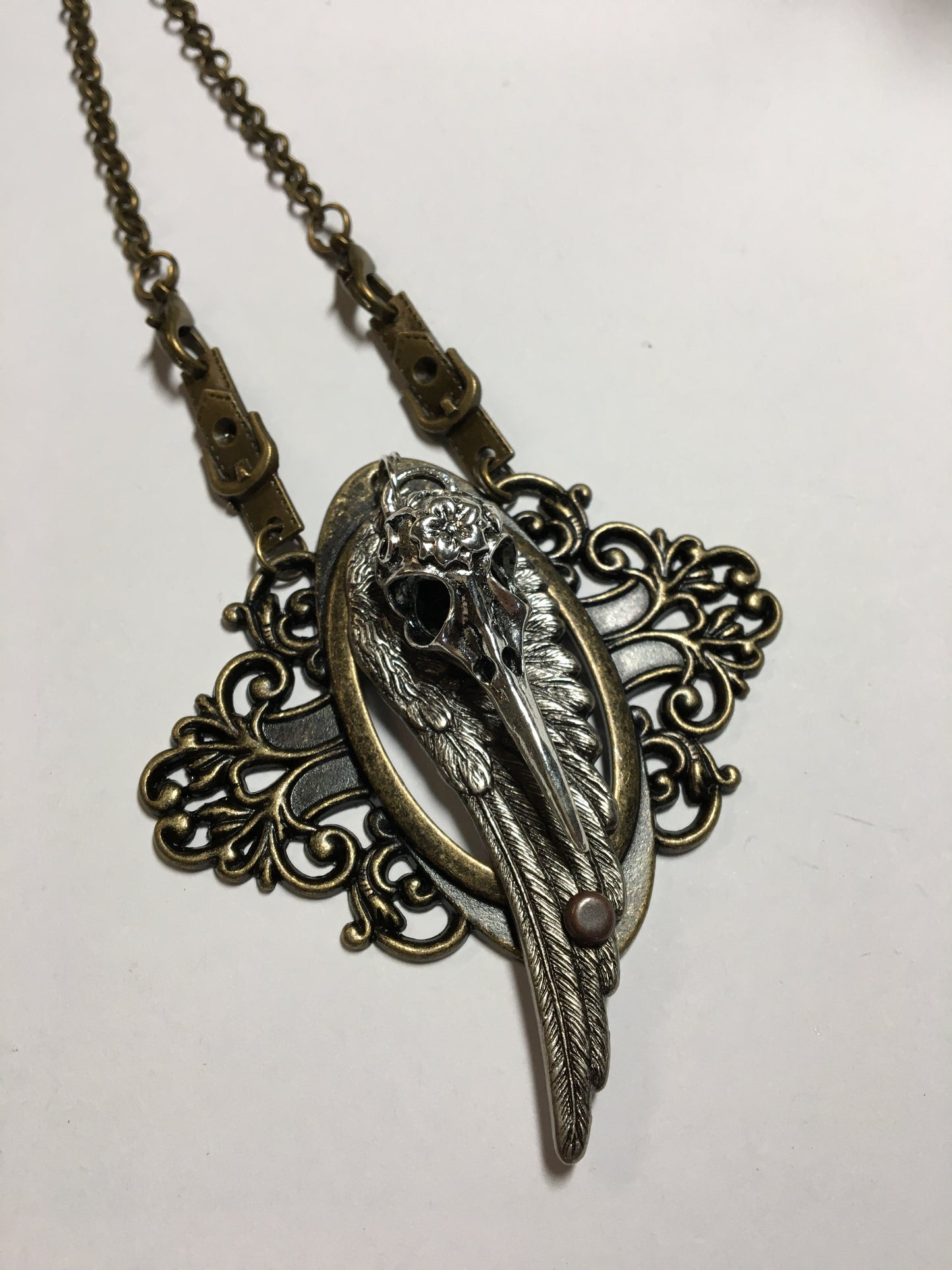classic raven bird bronze necklace