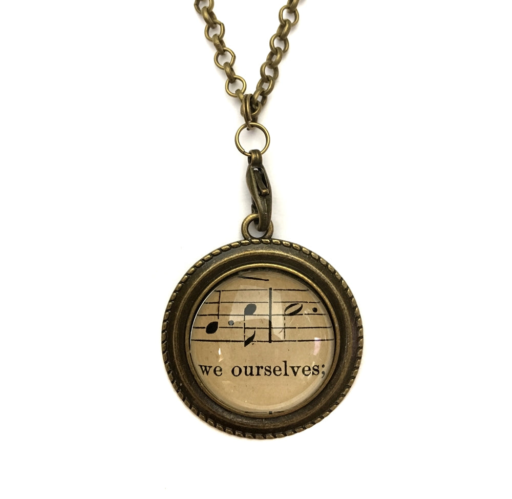 handmade real sheet music form the 1800's vintage necklace sealed under glass cabachon necklace Anthologie