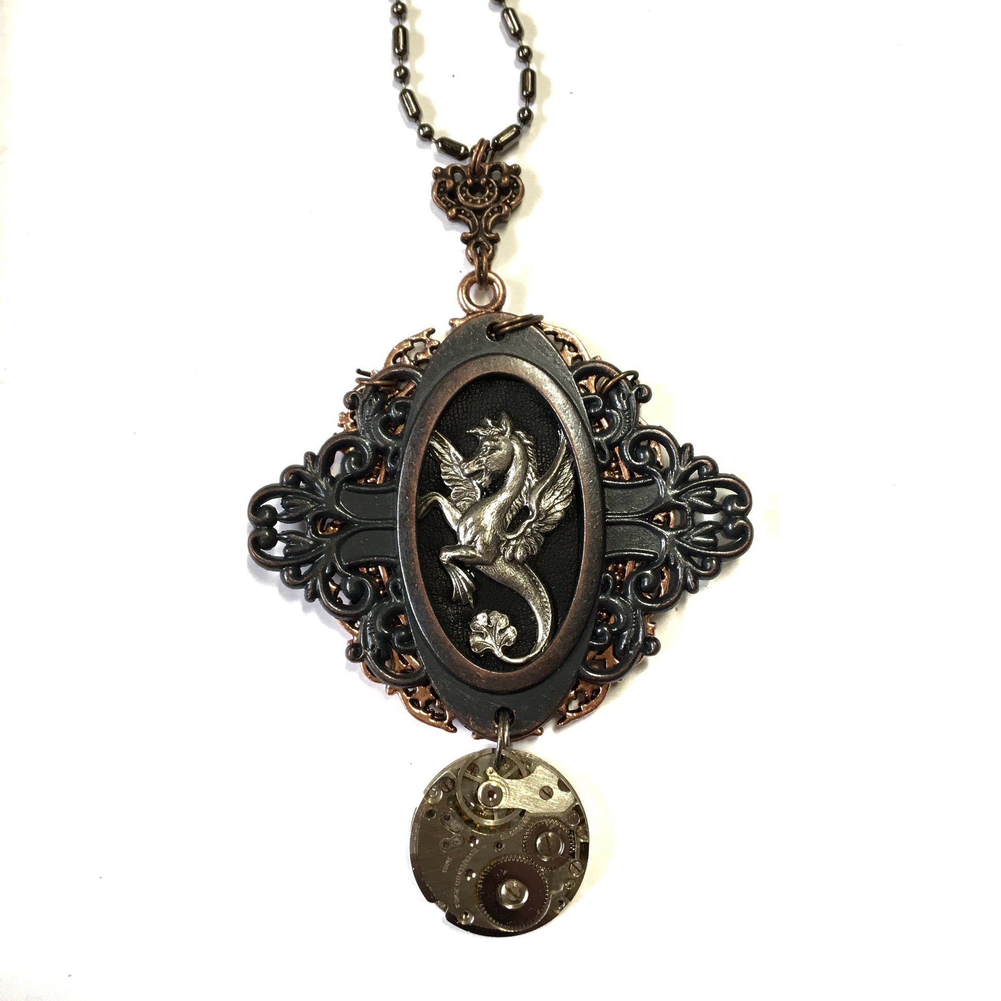 vintage watch parts on a retro feel necklace adorned with a pegasus stamping