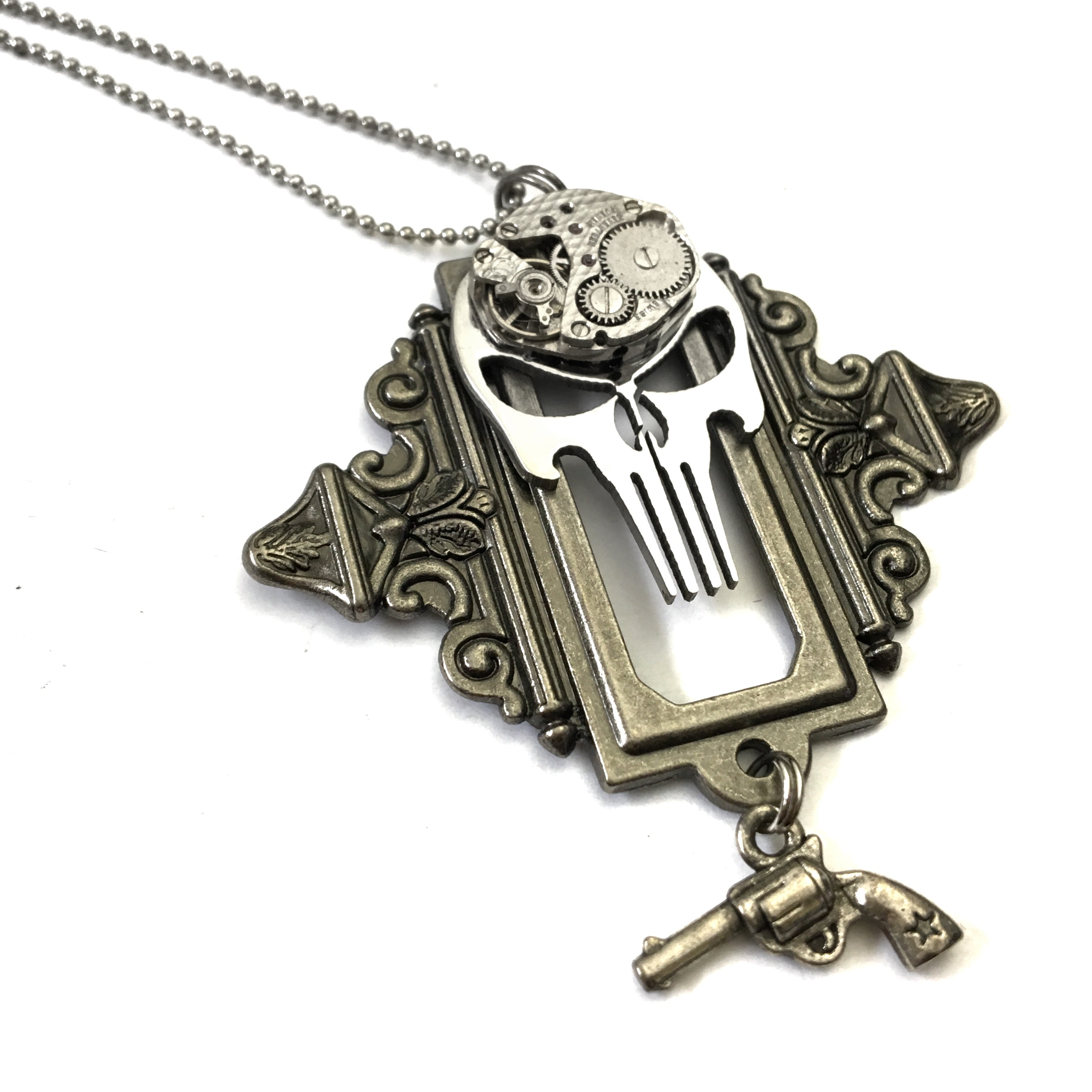 bronze necklace adorned with punisher and real vintage watch parts