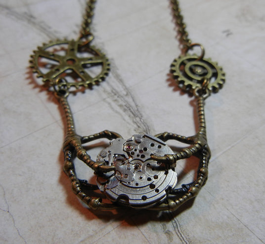 Claw and gears vintage look steampunk handmade necklace accessory with real watch parts