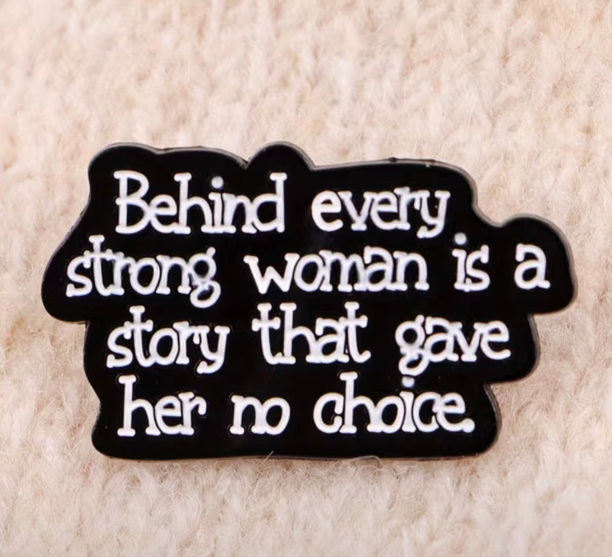 A Strong Woman Enamel Pin