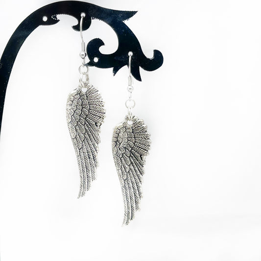 dangle silver wing earrings
